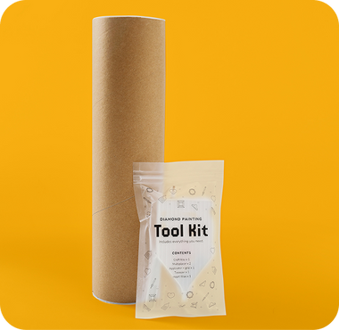 A kraft shipping tube with the sealed Pixelmade tool kit bag